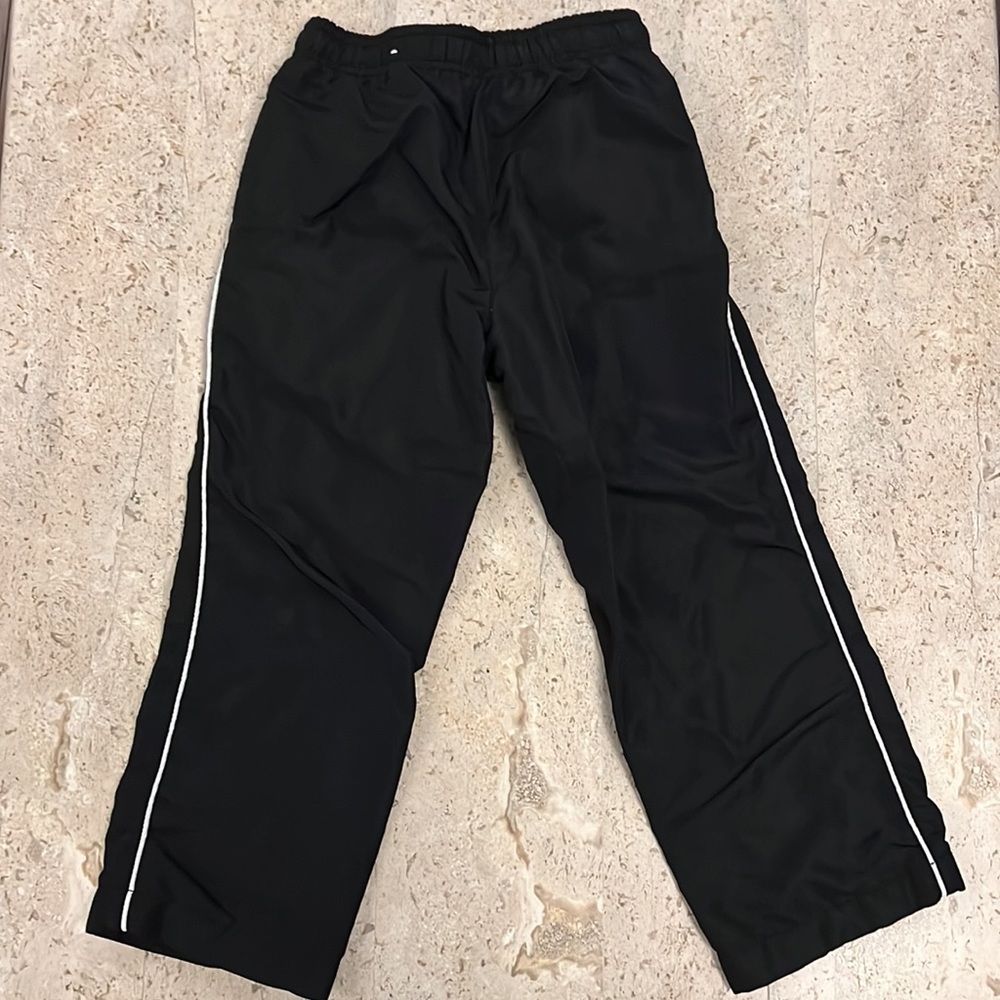 Nylon pull over style pants with pockets and thermal liner. Size 5/6 - Picture 2 of 4